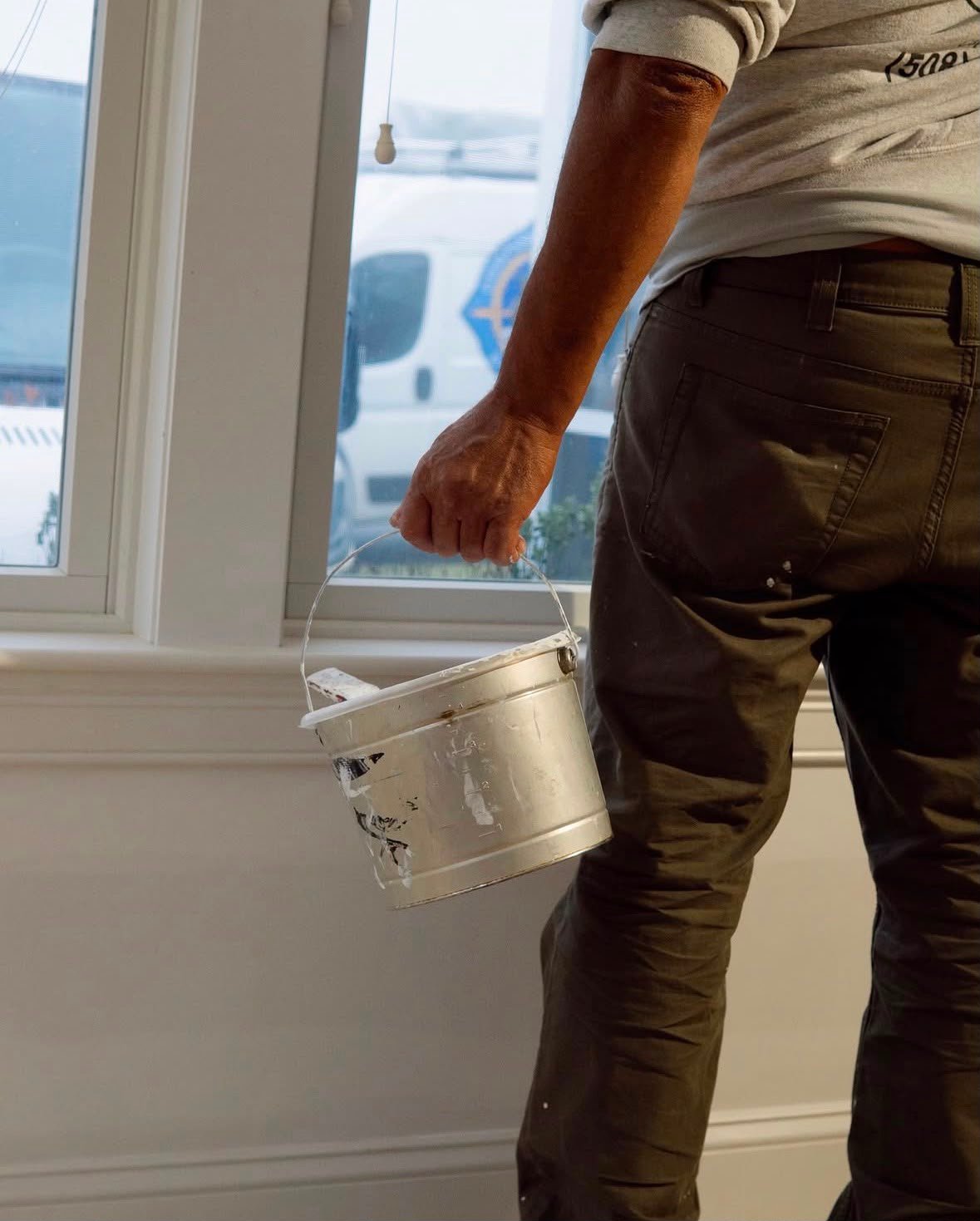 Compass Painting professional arriving prepared for an interior house painting project in Hyannis