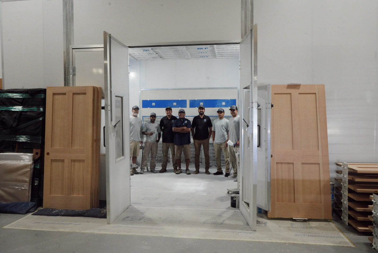 Compass Painting owners Ivan Junior and Leandro with their crew in Hyannis